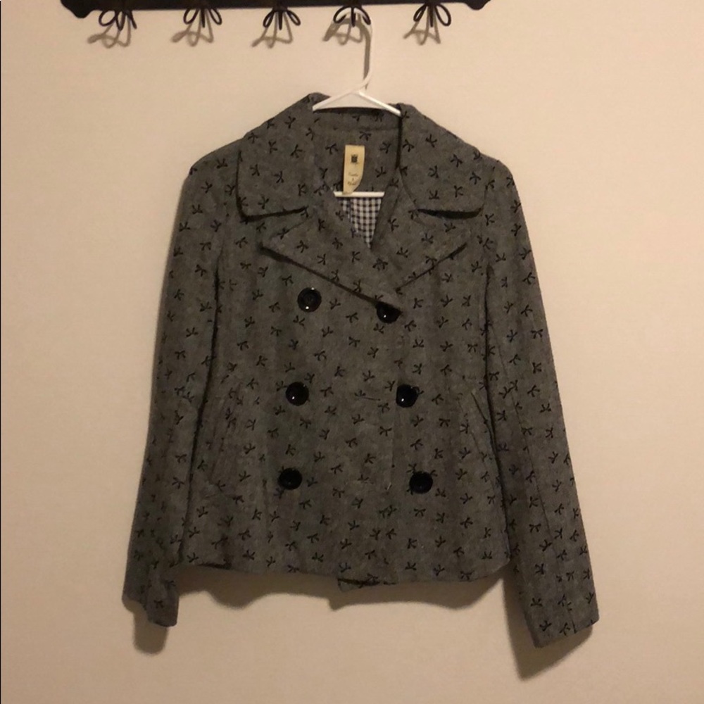 Black peacoat with bow pattern